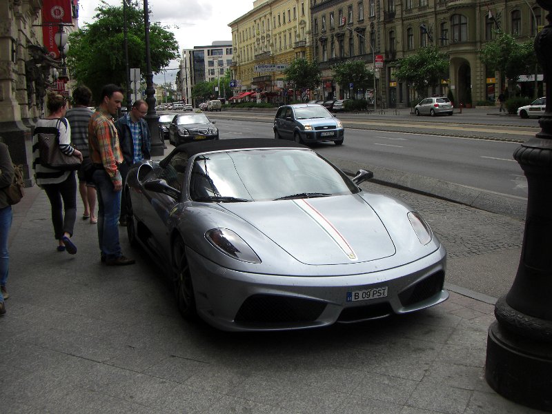 CIMG0323.JPG - Found this Ferrari parked on the sidewalk. I guess if you hae a Ferrari you can park wherever you want.
